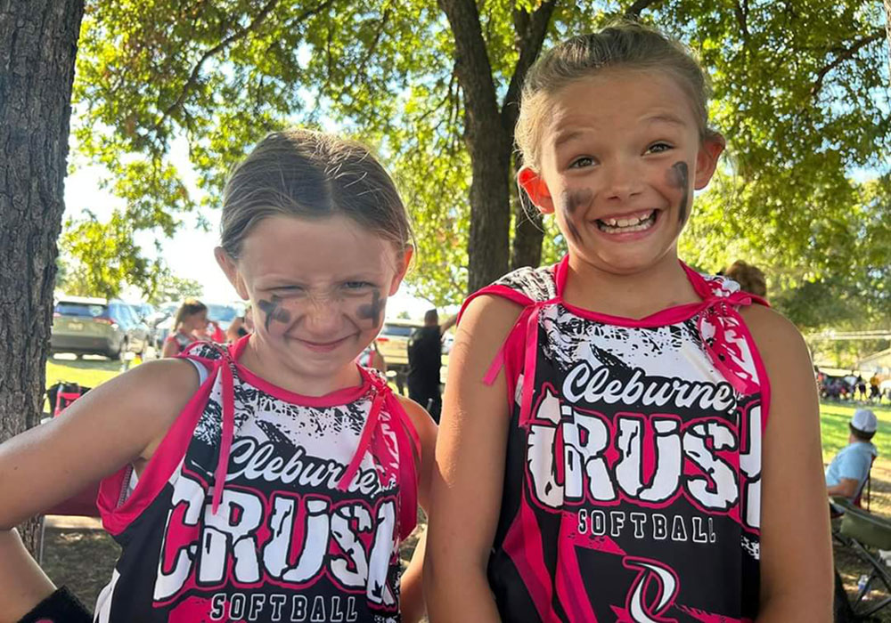 Team wearing custom D.L. Customs sportswear